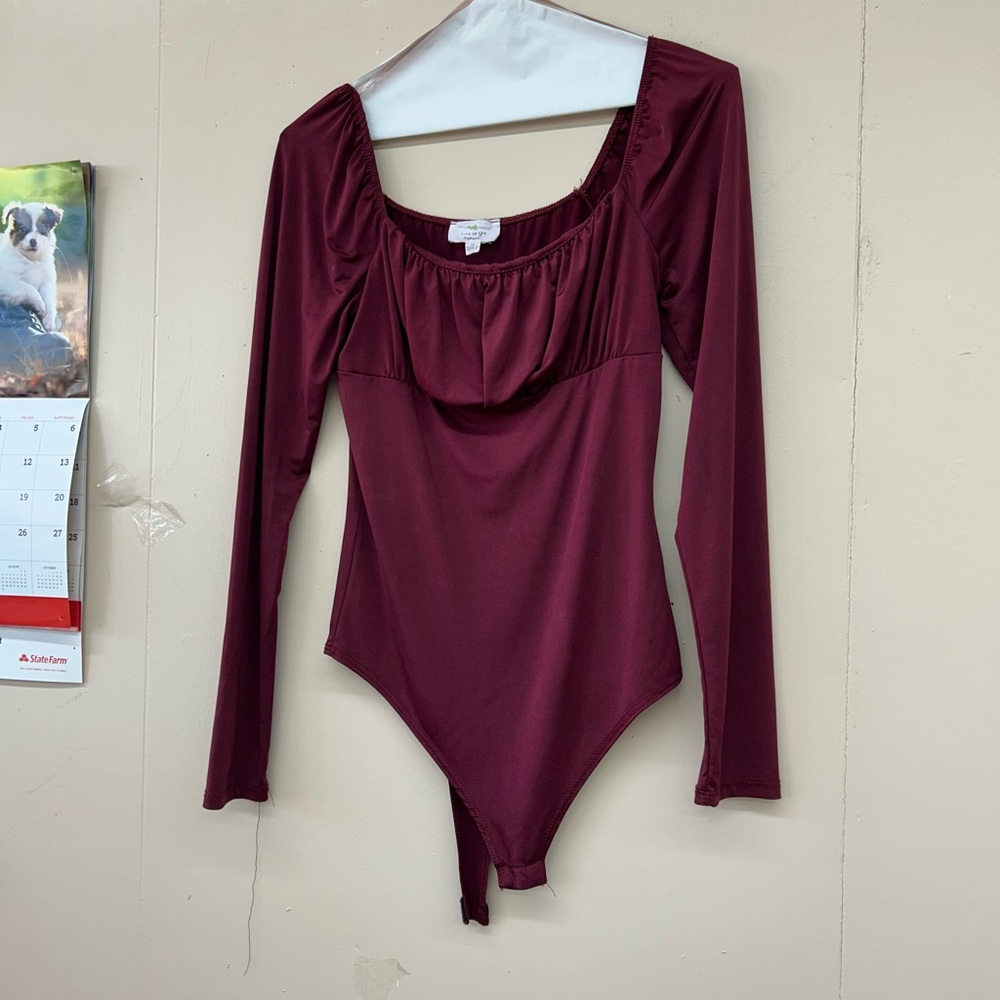 Burgundy Long Sleeve Bodysuit live in the moments